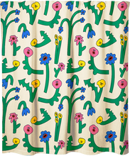Vibrant singing flower shower curtain designed by artist PONY for Costume de bain – a burst of colorful joy for your bathroom space.